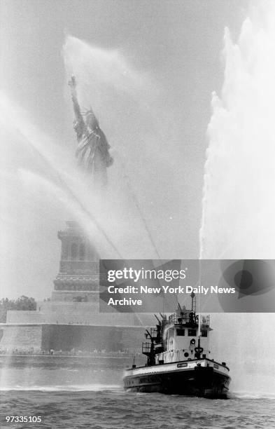 Operation Sail - Columbus Quincentennial , Celebrating the 500th anniversary of Christopher Columbus' landing in America. Fireboat sprays water as it...
