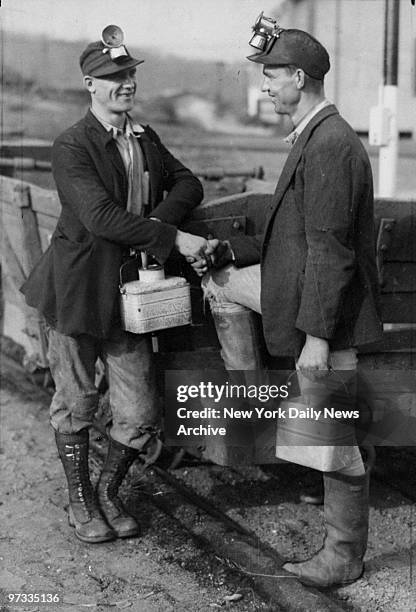 Walter Bezdziecke and Stanley Pornacter greet each other at work. They resume their work in the anthracite fields after a five-month coal miners'...