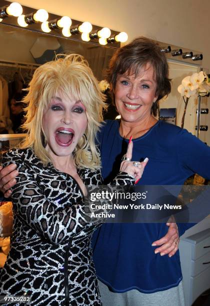Dolly Parton visits Jane Fonda backstage after performance at the Opening Night of the B'way Play "33 Variations" at the Eugene O'Neill Theater
