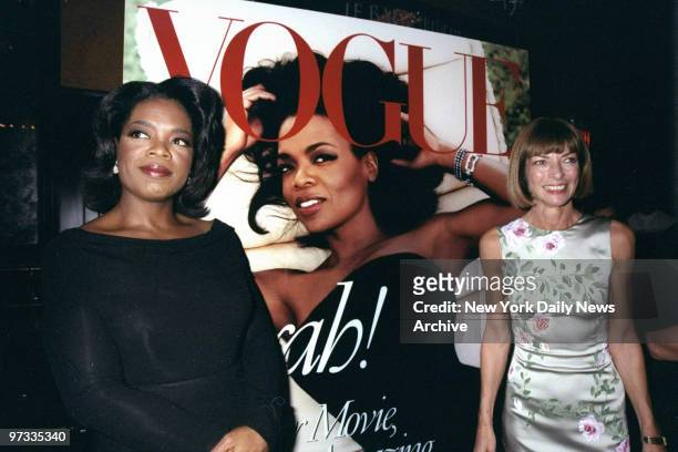 Oprah Winfrey joins Vogue editor Anna Wintour at party at Balthazar promoting the mag's October issue. That's Winfrey on the cover.,