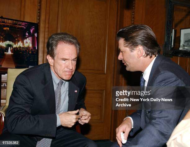 Warren Beatty meets with Alec Baldwin before Baldwin presented him with an award during the Brennan Center's Fifth Anniversary Awards Dinner at...