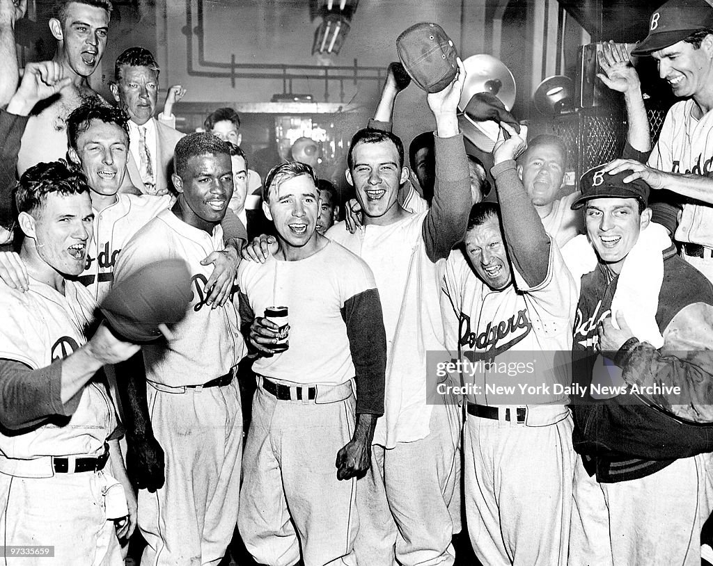 Dodgers celebrate in the clubhouse after defeating the Phila