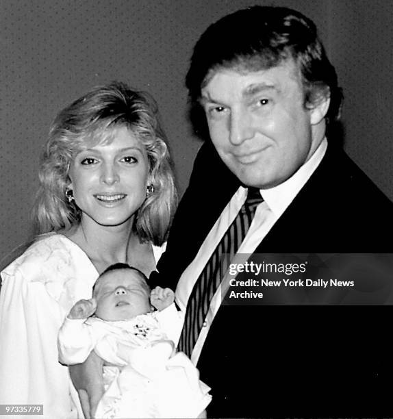 Donald Trump and Marla Maples with their newborn baby Tiffany.