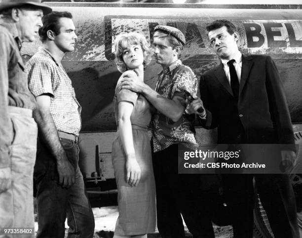 Television series, Alfred Hitchcock Presents. Episode, Escape to Sonoita. Pictured from left is James Bell , Burt Reynolds , Venetia Stevenson ,...