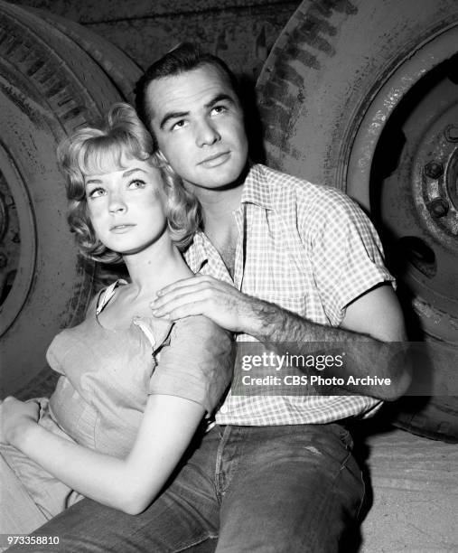 Television series, Alfred Hitchcock Presents. Episode, Escape to Sonoita. Pictured from left is Venetia Stevenson , Burt Reynolds . Originally...