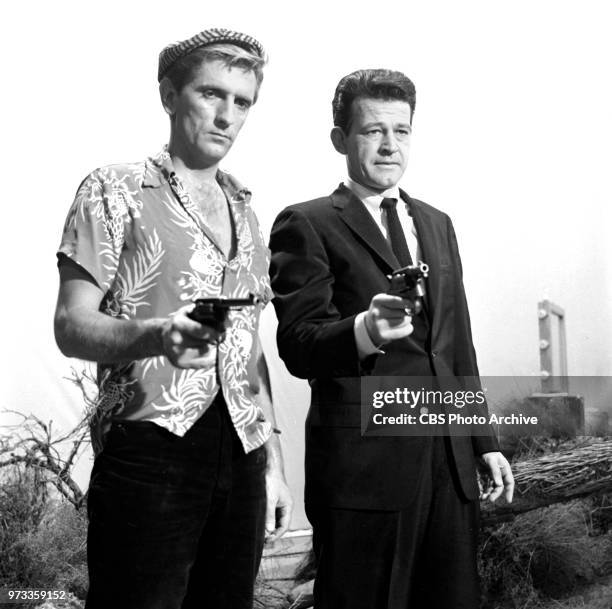 Television series, Alfred Hitchcock Presents. Episode, Escape to Sonoita. Pictured from left is Harry Dean Stanton and Murray Hamilton . Originally...