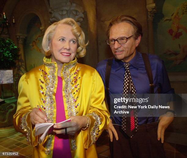 Wax doubles of gossip columnist Liz Smith and TV's Larry King get together at the new Madame Tussaud's wax museum in Times Square.