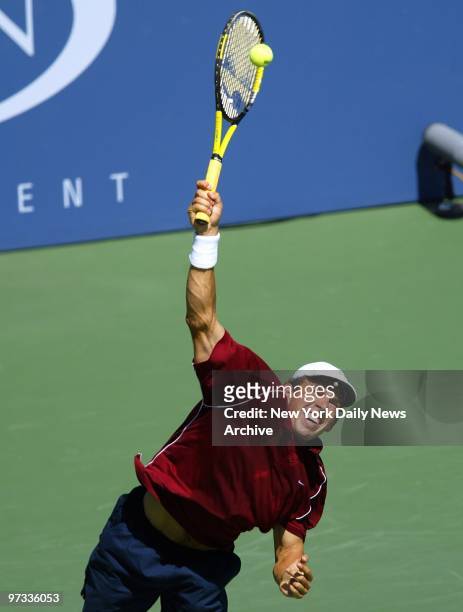 Dominik Hrbaty of Slovakia serves to Paradorn Srichaphan of Thailand in the U.S. Open at Flushing Meadows-Corona Park. Srichaphan, the No. 11 seed,...