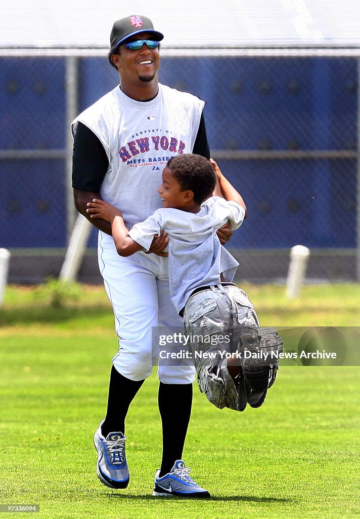 New York Mets' pitcher Pedro Martinez has some fun with a yo