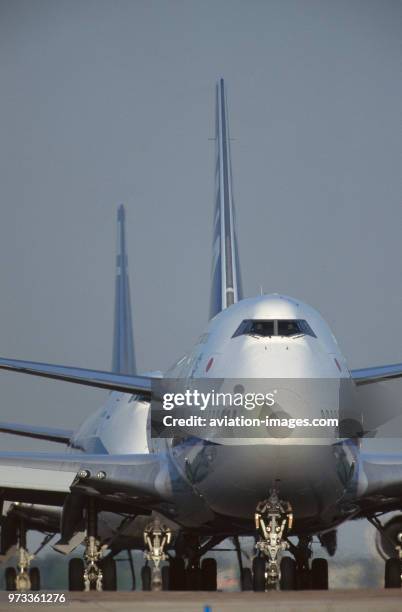 All Nippon Airways and El-Al Boeing 747-400s taxiing in a queue before take off.