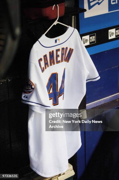 Outfielder Mike Cameron's jersey hangs in the New York Mets' dugout at Shea Stadium during a game against the Pittsburgh Pirates. Cameron collided...