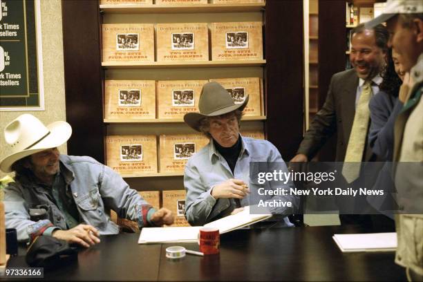 Don Imus and his brother Fred sign their book "Two Guys Four Corners" at the Barnes and Noble book store on Fifth Ave.