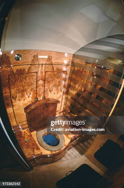 Gulfstream 500 lavatory with beautiful walnut wooden wall panels and mirrors of golfer Greg Norman's private-jet.