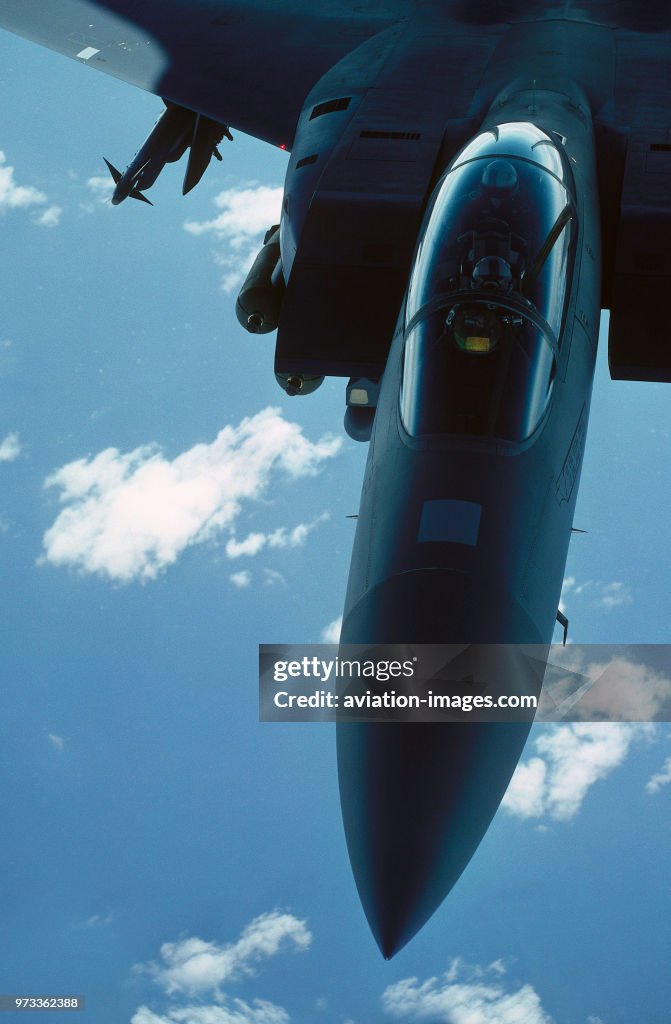 Windshield and nose of a USAF Boeing F-15E Strike Eagle of 335 Sqn armed with a full load of 500 pound bombs and a missile