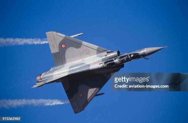 French AirForce Dassault Mirage 2000 in the flying-display with smoke at the 1997 Dubai International Air Show.