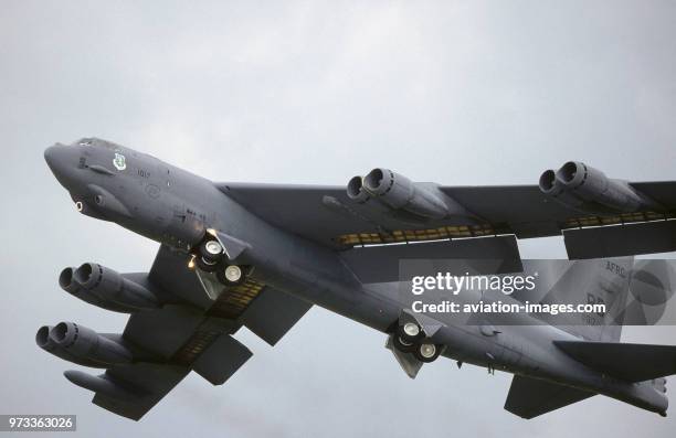 Boeing B-52H Stratofortress taking-off with undercarriage retracting and trailing-edge wing flaps lowered at the 1998 Fairford Royal International...