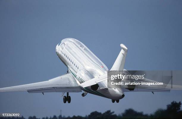 Dassault Falcon 2000 taking-off with satellite communications aerial on the tail at the 1998 Farnborough Airshow.