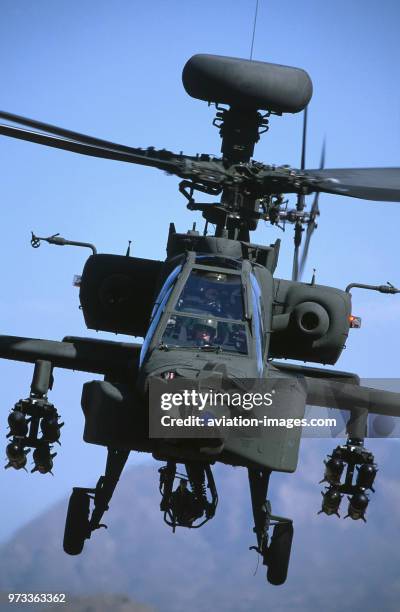 Army Boeing AH-64D Apache Longbow low-flying over the Four Peaks desert area of Tonto National Forest, flown by test pilot - Pete Nicholson.