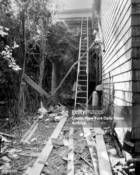 Outside the home Edith Bouvier Beale at West End Road in East Hampton, L.I. Ladder leads up to roof which is under repair.