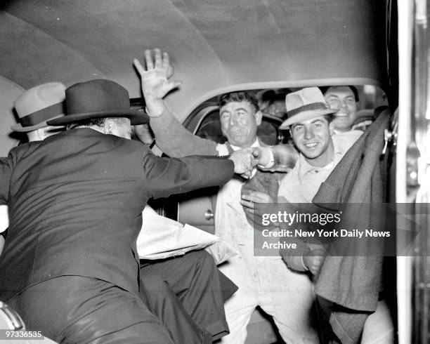 West Side Highway workers take over Mayor Fiorello LaGuardia car in their glee over the Tiger's defeat.