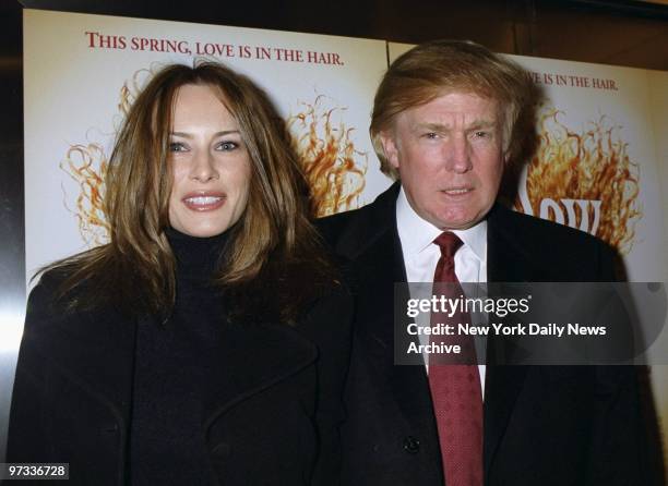 Donald Trump and girlfriend Melania Knauss arrive for a screening of the movie "Blow Dry" at the Paris Theater.