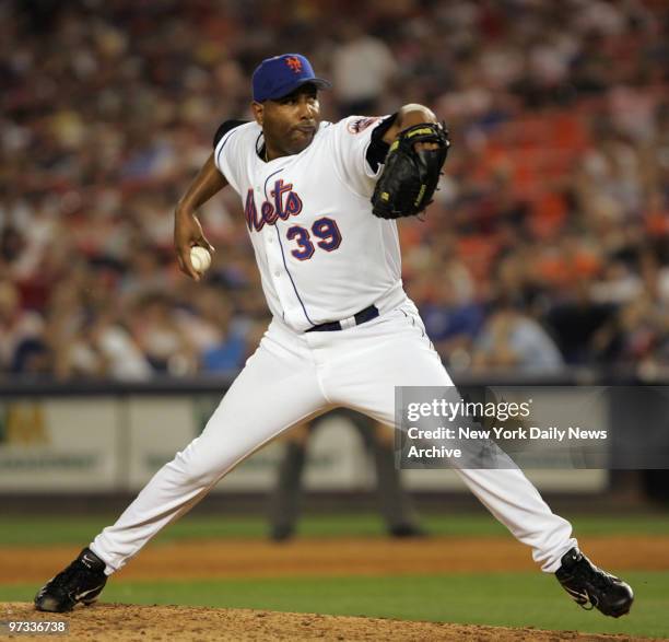 New York Mets' relief pitcher Roberto Hernandez throws the ball in a game against the Milwaukee Brewers at Shea Stadium. Milwaukee won, 6-4.