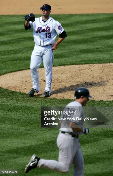New York Mets' reliever Billy Wagner, who entered the game at the start of the ninth, wears a rueful expression after walking New York Yankees'...