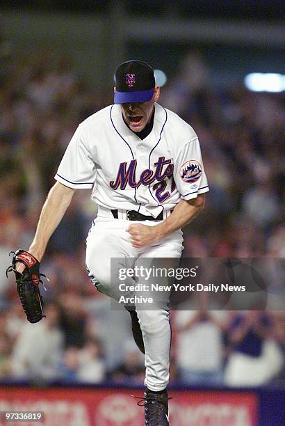 New York Mets' reliever Dennis Cook pumps his fist after getting a strikeout to end the eighth inning against the Toronto Blue Jays. The Mets went on...