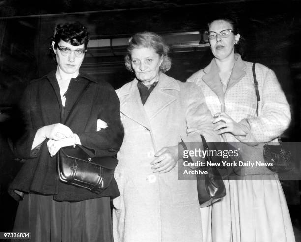 Donna LaMarca, wife of kidnapper Angelo LaMarca with his mother Vitina LaMarca and sister-in-law Frances at Nassau County Courthouse in Mineola, L.I..