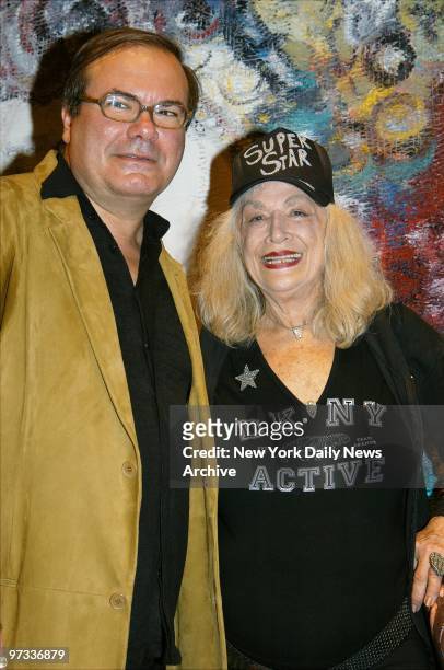 Painter Hunt Slonem is joined by actress Sylvia Miles to celebrate the publication of "Hunt Slonem: An Art Rich and Strange" at the DKNY store on W....