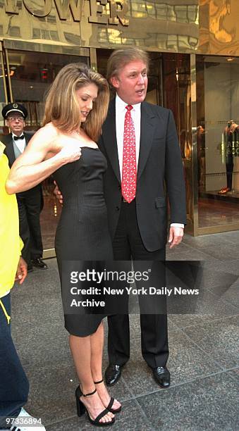 Donald Trump joins Miss USA Shawnea Jebbia outside Trump Tower on Fifth Ave., to film a TV commercial for Russell Simmons' Phat Farm Clothing. Jebbia...