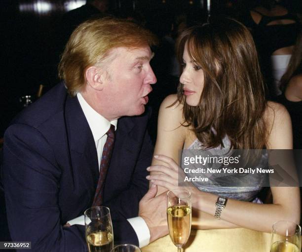 Donald Trump plays a closeup scene with friend Melania Knauss at the Paramount Hotel's 10th anniversary party at the hotel on W. 46th St.