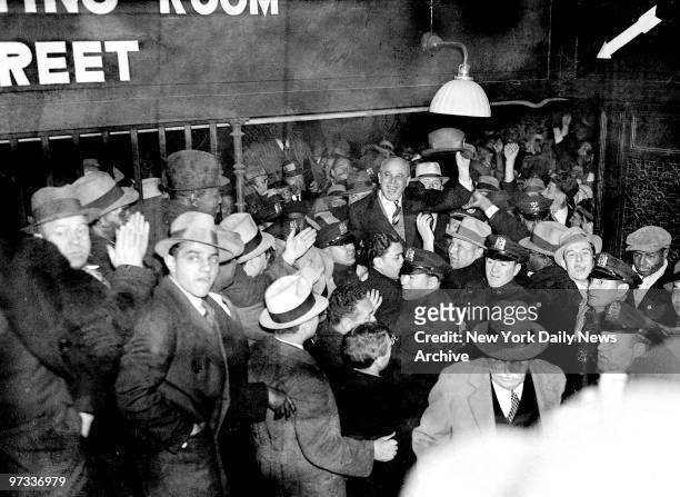 Wildly cheering 000 men, women and children gather at Pennsylvania Station to greet Samuel Leibowitz, defender of the Scottsboro boys. The crowd...