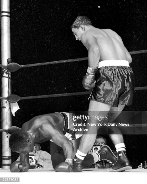 When Ezzard Charles was dropped by Rocky Marciano for a coun When Ezzard Charles was dropped by Rocky Marciano for a coun
