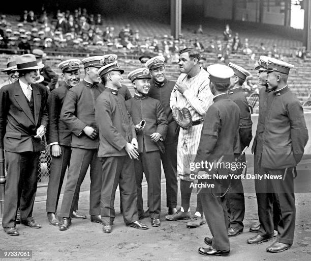 When officers of the Japanese Fleet, visiting New York City, went to Yankee Stadium to see the ball game, Babe Ruth, who equaled his homerun record...