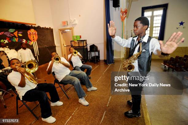 When the music teacher at PS 37 left due to budget cuts, 11-year-old 6th grader Paul Sheriff volunteered to do the job and took over as music teacher...
