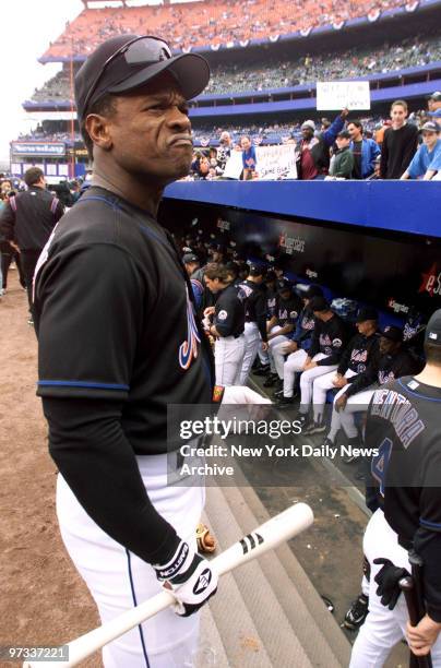 New York Mets' Rickey Henderson surveys the crowd at Shea Stadium before the home opener against the San Diego Padres.