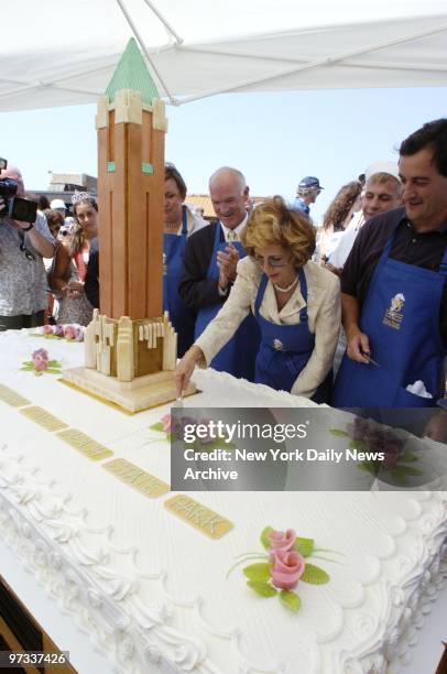 Parks Commissioner Bernadette Castro cuts a big birthday cake at a celebration of the 75th anniversary of Jones Beach State Park in Wantagh, L.I....