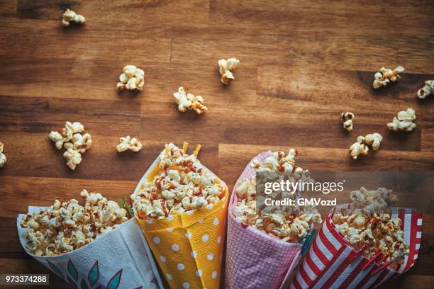 homemade salted caramel popcorn - home salted stock pictures, royalty-free photos & images