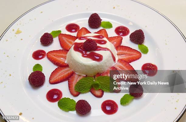 Panna cotta custard with strawberry salad and raspberry sauce at San Domenico restaurant on Central Park South.
