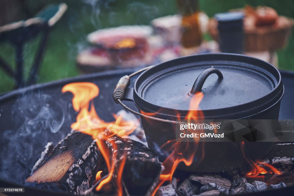 Cooking Chili Con Carne in Dutch Oven over Logfire