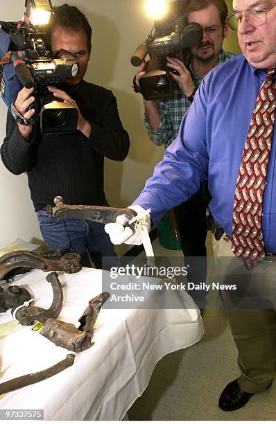 Parts from truck that transported explosives used in the 1998 bombing of the U.S. Embassy in Nairobi, Kenya, are on display at the U.S. Attorney's...