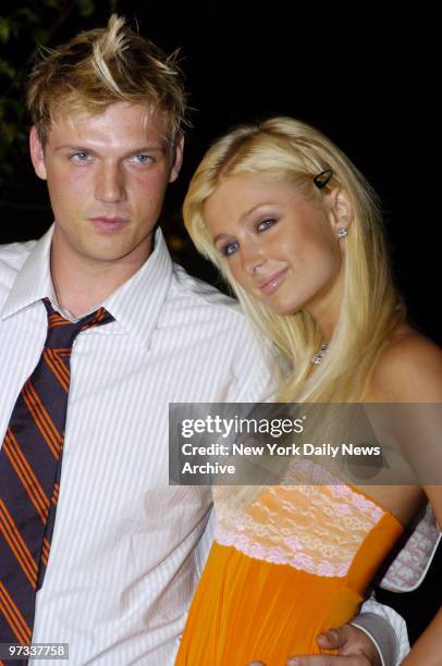 Paris Hilton and beau Nick Carter of the Backstreet Boys are on hand for a party at PlayStation 2 in Bridgehampton, L.I.