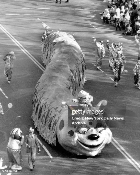 Double Bug bats her eyelashes and snakes along Central Park West in the Macy's Thanksgiving Day Parade.