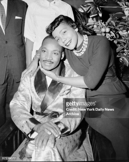 Dr. Martin Luther King and his wife, Coretta, are smiling and cheerful during their interview yesterday in Harlem Hospital.
