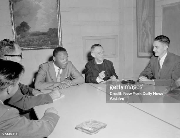Dr. Martin Luther King and Rev. Ambrose Reeves, Anglican Bishop of Johannesburgh and opponent of segregation on South Africa hold a press conference.