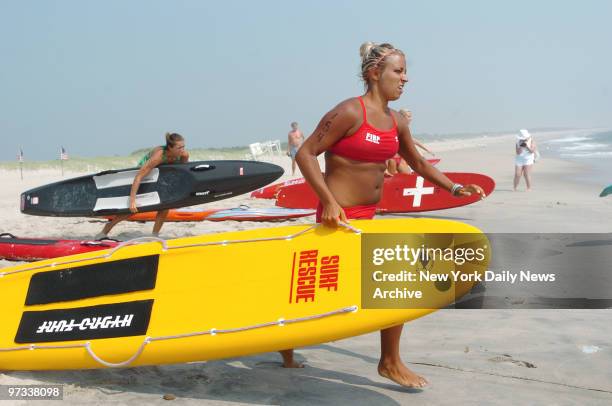 Participants compete in the 21st annual All-Women Lifeguard Tournament on the beach at Sandy Hook, NJ. The competition included racing and rescue...