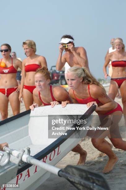 Participants compete in the 21st annual All-Women Lifeguard Tournament on the beach at Sandy Hook, NJ. The competition included racing and rescue...