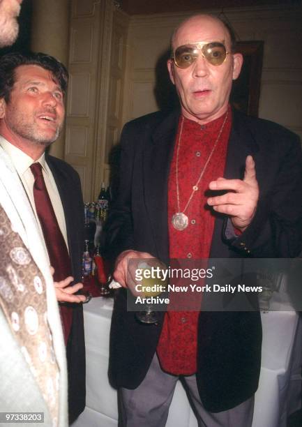 Dr. Hunter S. Thompson and Jann Wenner attending Thompson's book party at the Players Club.
