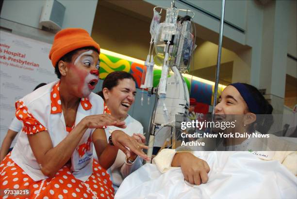 Dr. Ima Confused entertains Susan Ayala and her mother, Alex, as the Big Apple Circus Clown Care program celebrates its 20th anniversary with a visit...